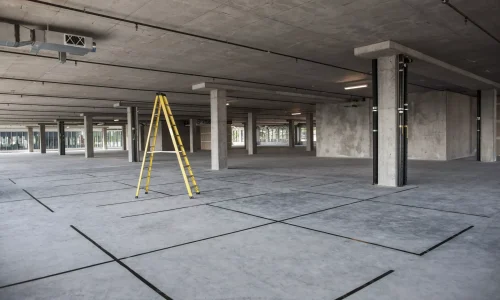 AnyConv.com__large-empty-raw-office-space-with-a-ladder-set-up-2025-04-03-18-40-59-utc
